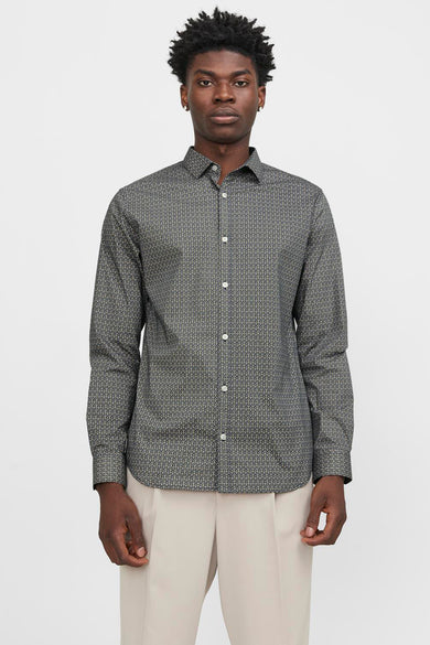 Chemise à manches longues bleue de PREMIUM by JACK & JONES, avec motif géométrique sur l'ensemble et coupe ajustée.