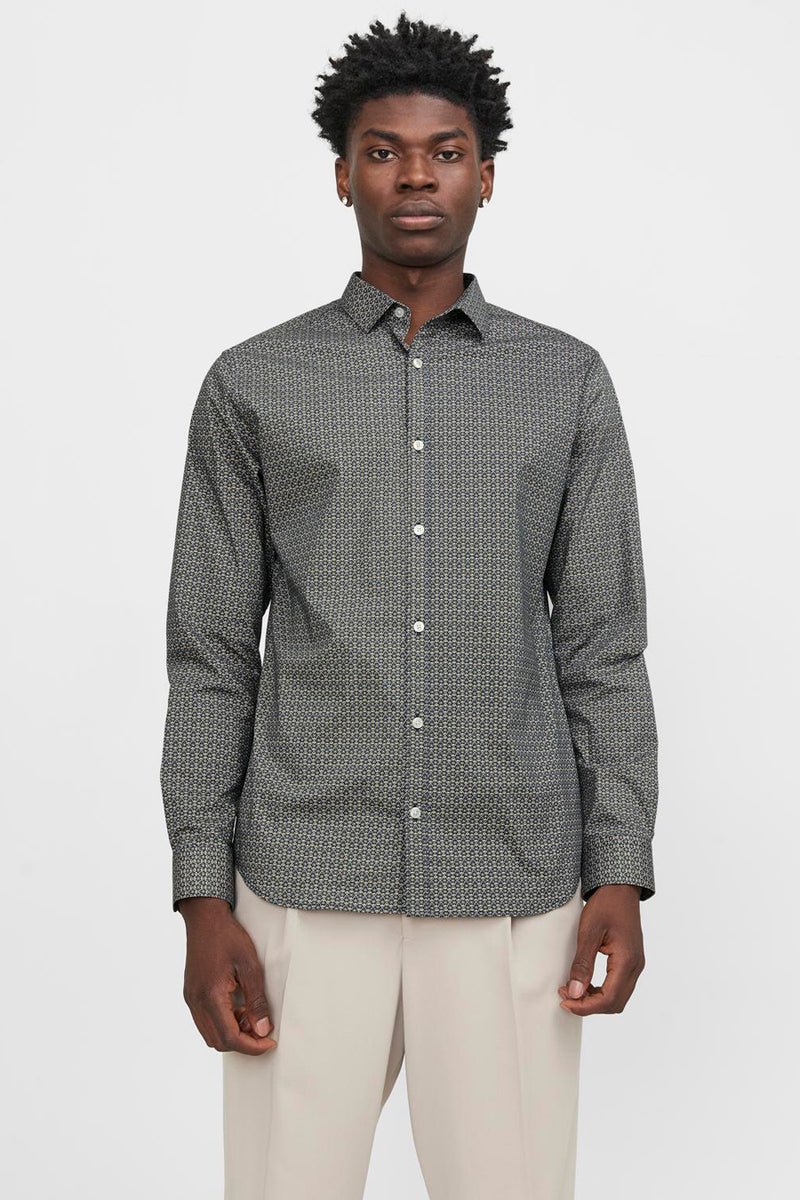Chemise à manches longues bleue de PREMIUM by JACK & JONES, avec motif géométrique sur l'ensemble et coupe ajustée.