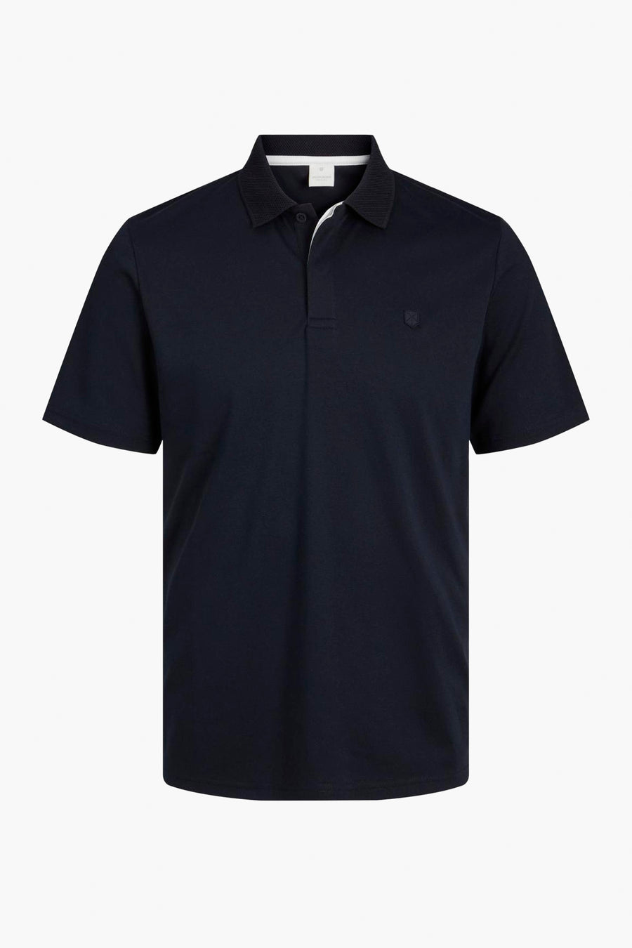 Marineblauwe polo van PREMIUM by JACK & JONES, met witte kraag en knoopsluiting.