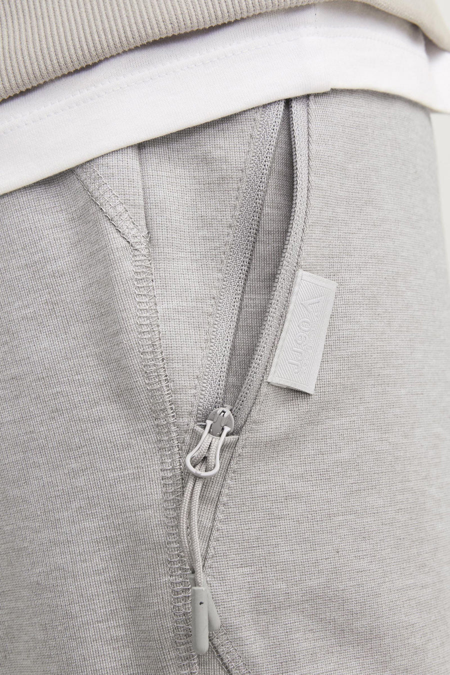 Grijze sportshort JACK & JONES JEANS INTELLIGENCE met zak met rits.
