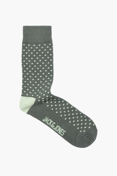 Chaussettes vertes à pois, par ACCESSORIES BY JACK & JONES, avec bord côte et bout du pied vert d'eau.