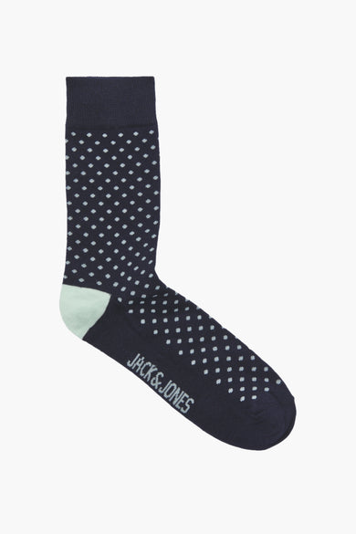 Chaussette bleue à pois, de ACCESSORIES BY JACK & JONES, avec talon vert d'eau et logo sur le côté.