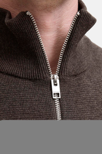 Brown ribbed knit turtleneck sweater with silver zipper by Jack & Jones, close-up front view showing textured fabric and collar detail
