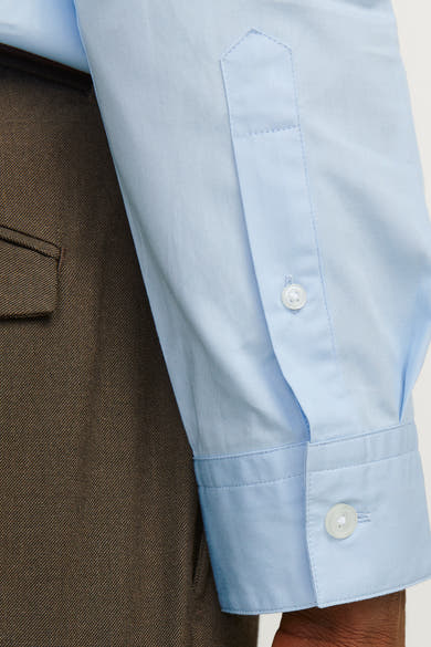 Blauw overhemd met lange mouwen van PREMIUM BY JACK & JONES, met zichtbare knoopsluiting en knoopmanchetten.