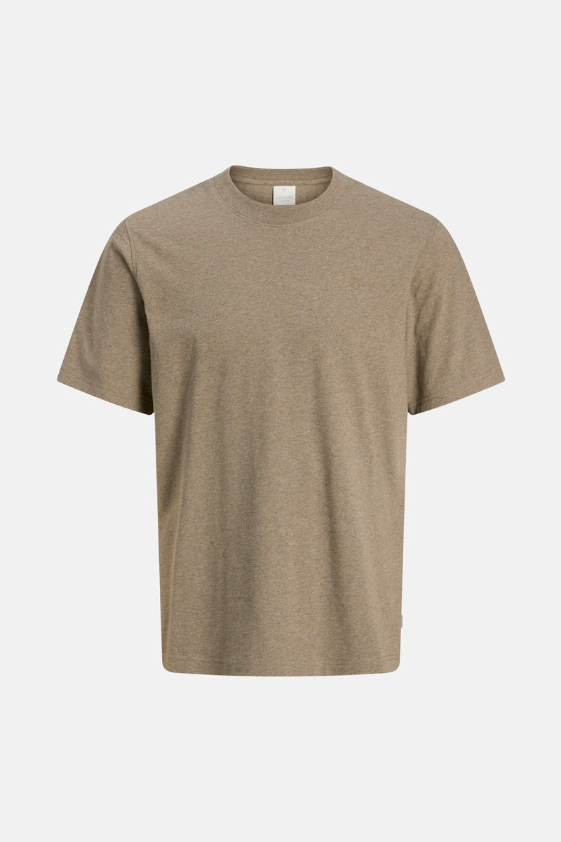 T-shirt à manches courtes beige de PREMIUM by JACK & JONES, avec un petit logo discret sur la poitrine.