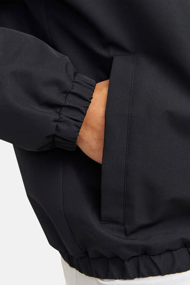 Zwarte regenjas van ORIGINALS BY JACK & JONES, met subtiele textuur en steekzak.