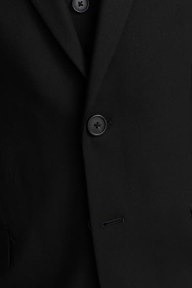 Blazer noir by PREMIUM by JACK & JONES, avec boutonnière et boutons noirs.