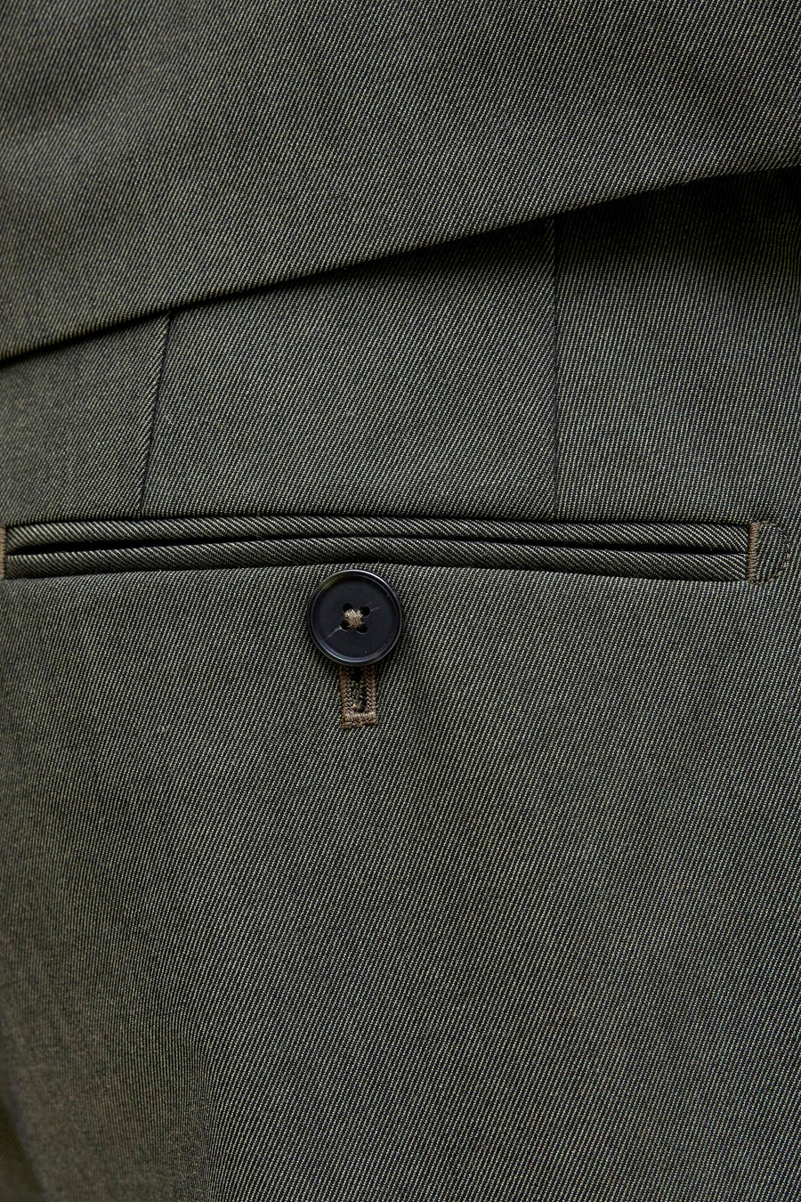 Groene kostuumbroek van PREMIUM by JACK & JONES, met achterzak met knoop.