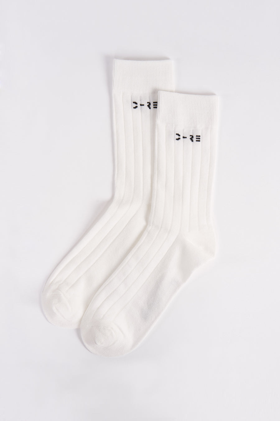 Chaussettes blanches côtelées par ACCESSORIES BY JACK & JONES, avec motif minimaliste sur la tige.