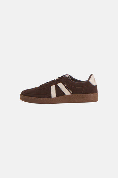 Brown suede sneakers with white side stripes by Jack & Jones, featuring a gum rubber sole and lace-up front, side view.