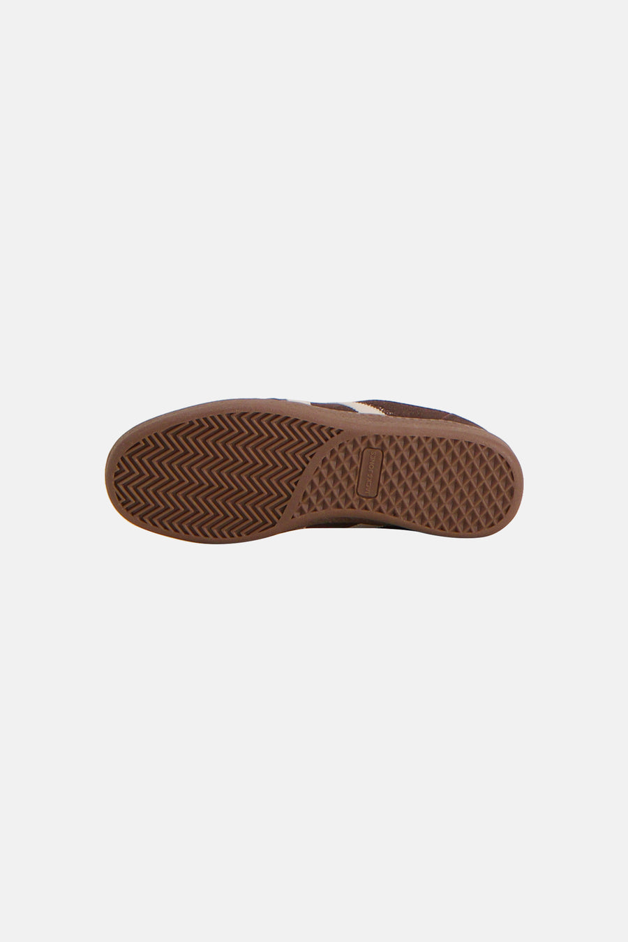 Brown low-top sneaker by Jack & Jones, showing textured rubber sole with zigzag and diamond tread patterns, bottom view.