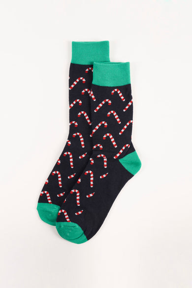 Chaussettes noires ACCESSORIES BY JACK & JONES à motif de cannes de Noël rouges et blanches, bordures vertes.