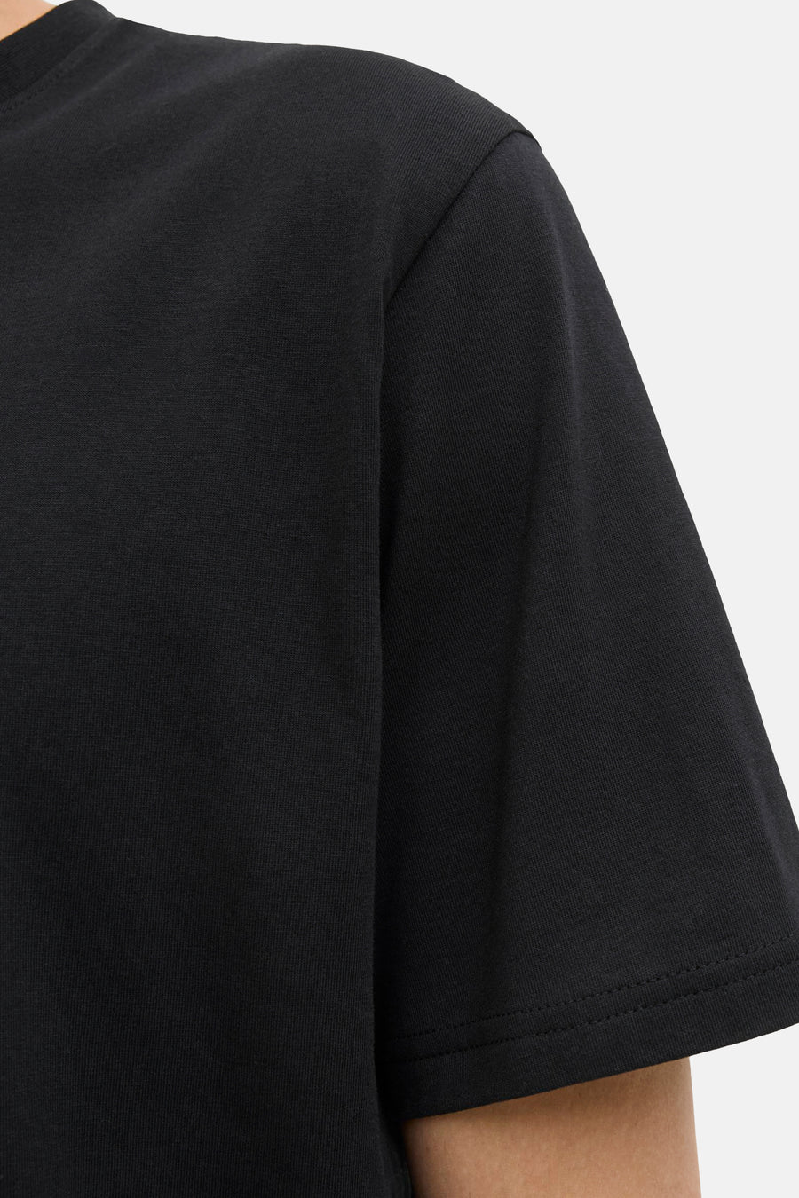 T-shirt noir à manches courtes de Originals by Jack & Jones, montrant une texture de coton.