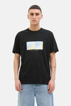 T-shirt noir à manches courtes par Originals by Jack & Jones, avec motif graphique géométrique sur le devant.
