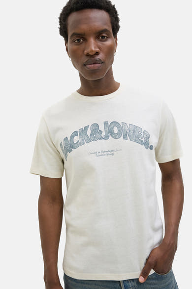 T-shirt à manches courtes jaune par ORIGINALS BY JACK & JONES avec un imprimé graphique sur le devant.