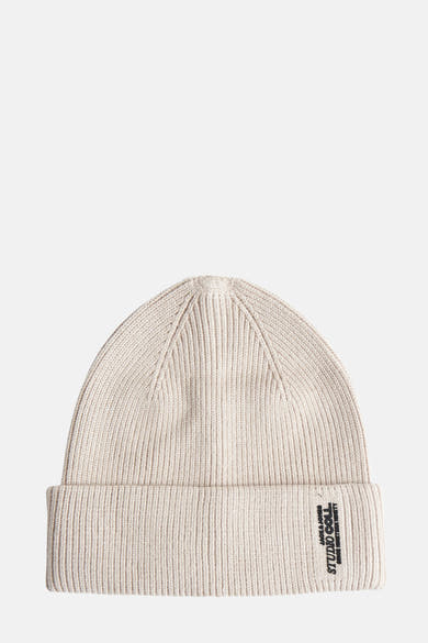 Bonnet beige en maille côtelée de ACCESSORIES BY JACK & JONES, avec ourlet plié et étiquette noire cousue.