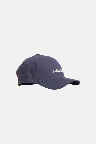 Casquette bleue d'ACCESSORIES BY JACK & JONES, avec inscription blanche sur le côté, vue de profil.