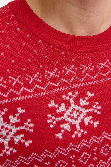 Pull à col rond rouge de JACK & JONES, avec motif de flocons de neige blancs.