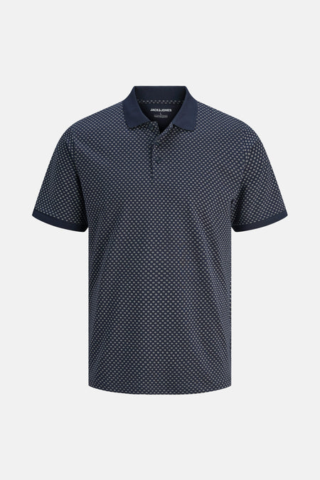 Marineblauwe polo met patroon, van JACK & JONES, met contrasterende kraag en mouwen.