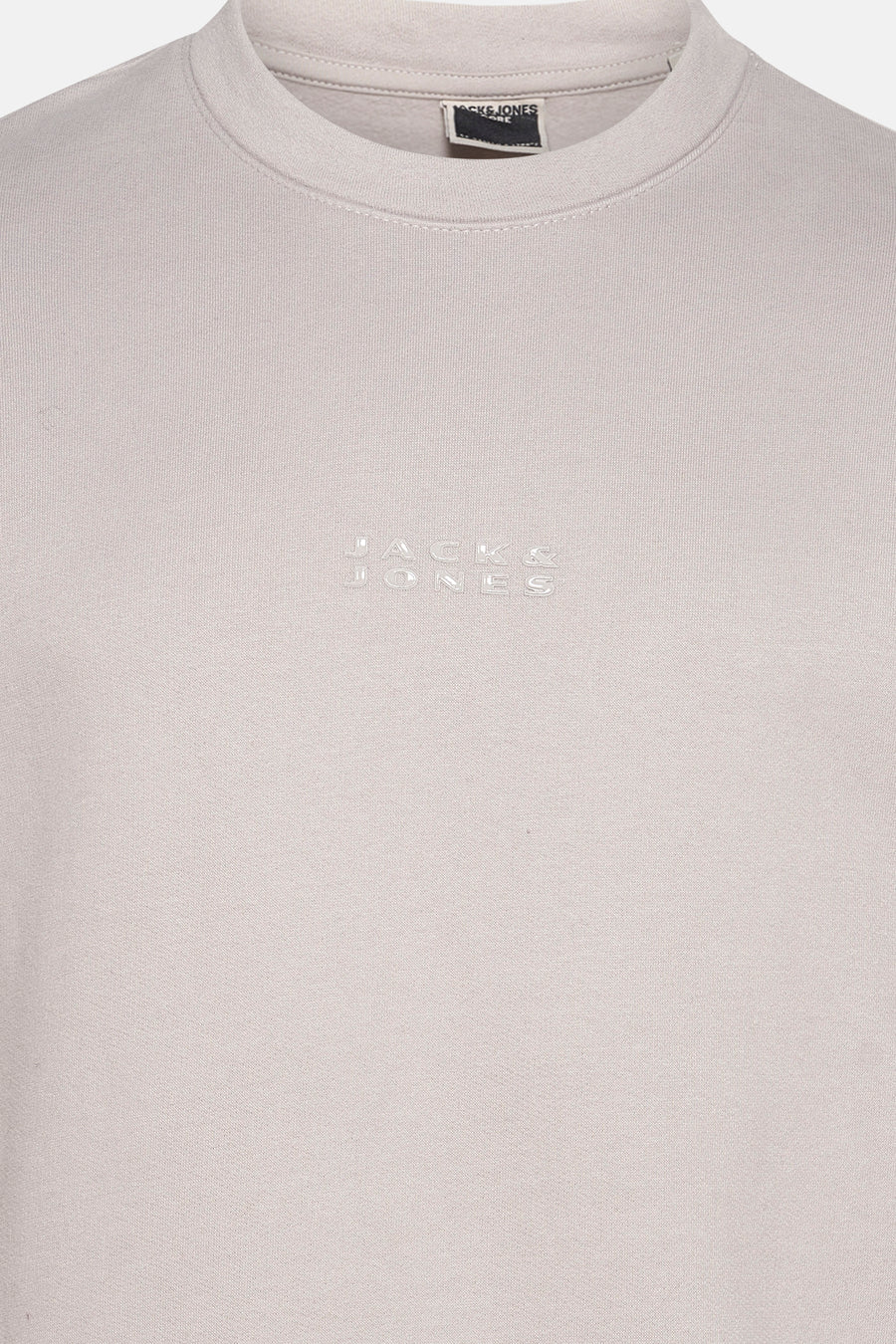 Lichtgrijs sweatshirt van PREMIUM by JACK & JONES, met discreet ton-sur-ton logo op de voorkant.