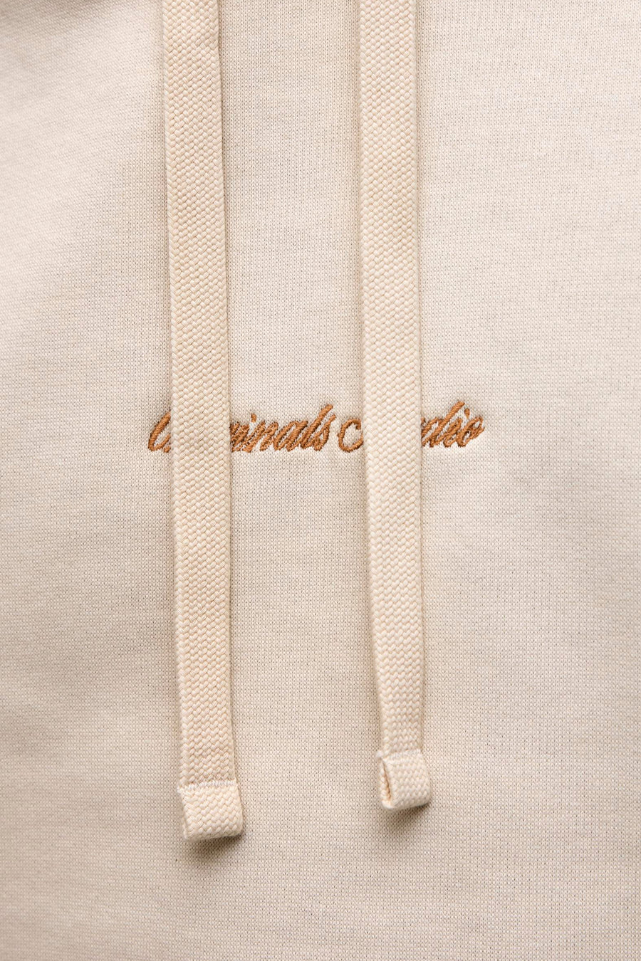 Beige hoodie van PREMIUM by JACK & JONES met koorden en ton-sur-ton borduursel.