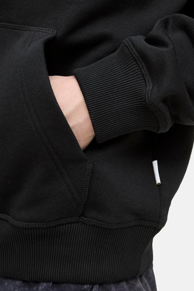 Zwarte hoodie van PREMIUM by JACK & JONES met een kangoeroezak.
