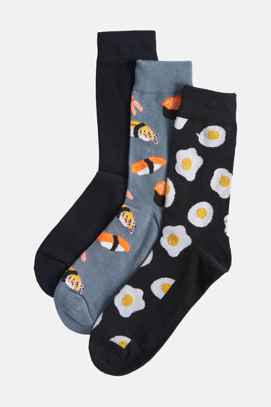 Lot de chaussettes multicolores by Accessories by Jack & Jones avec des motifs de sushi et œufs sur fond noir, gris et uni.