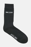 Chaussette grise par ACCESSORIES BY JACK & JONES, avec inscriptions «NINE.ZERO» et «JACK&JONES» en blanc.