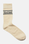 Chaussette écrue by ACCESSORIES BY JACK & JONES avec logo sur la tige et rayures décoratives.