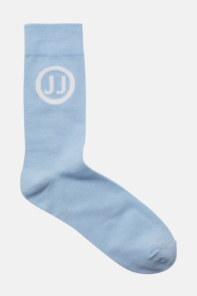 Chaussette bleu clair par ACCESSORIES BY JACK & JONES avec un logo JJ blanc sur la cheville.