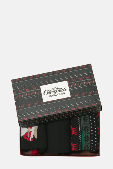 Geschenkdoos met zwarte sokken met kerstmotief van ACCESSORIES BY JACK & JONES, met rode rendieren, sterren en kerstbomen.