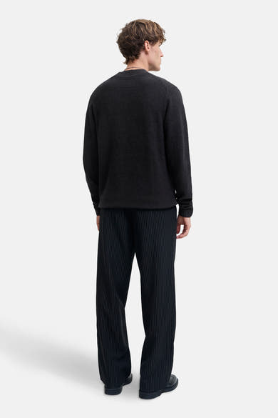 Zwart poloshirt met korte mouwen van JACK & JONES, effen met een klassieke kraag.