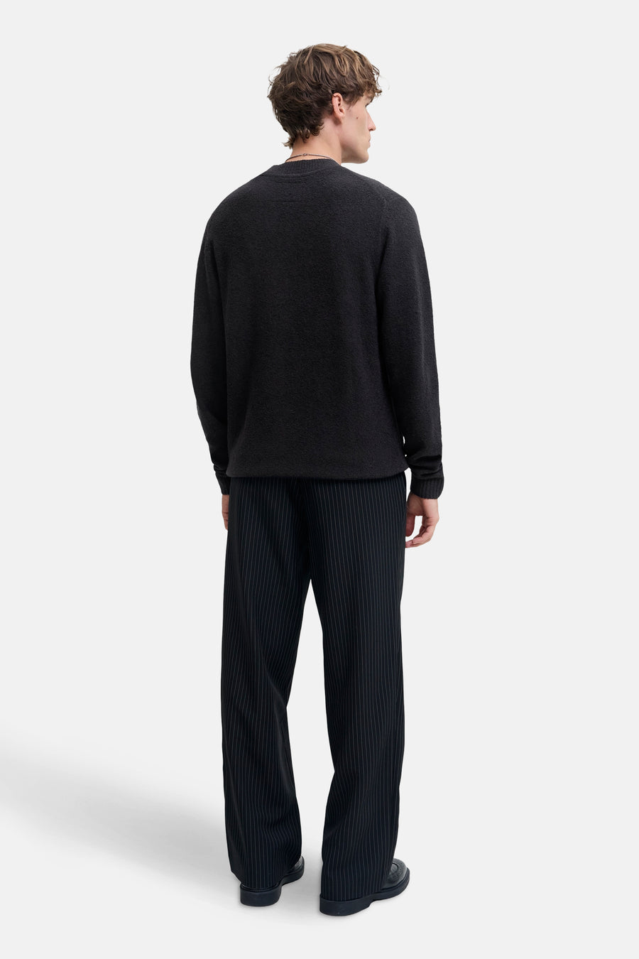 Zwart poloshirt met korte mouwen van JACK & JONES, effen met een klassieke kraag.