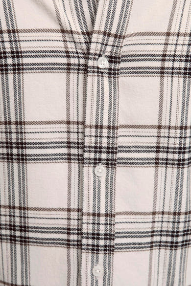 Chemise à manches longues beige, par JACK & JONES, à motif à carreaux brun et noir.