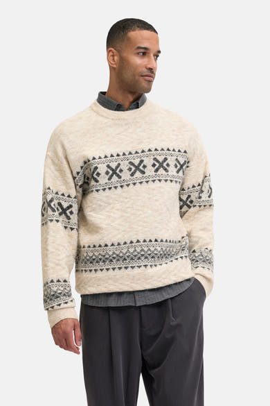 Pull à col rond écru de JACK & JONES avec motifs géométriques noirs et style décontracté.