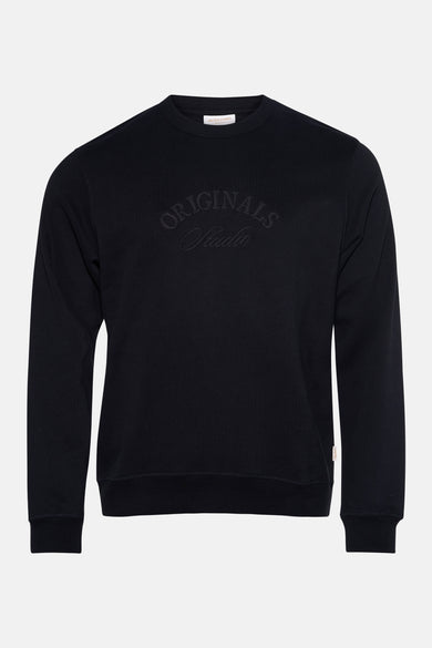 Sweat col rond noir de JACK & JONES avec inscription "Originals Studio" brodée.
