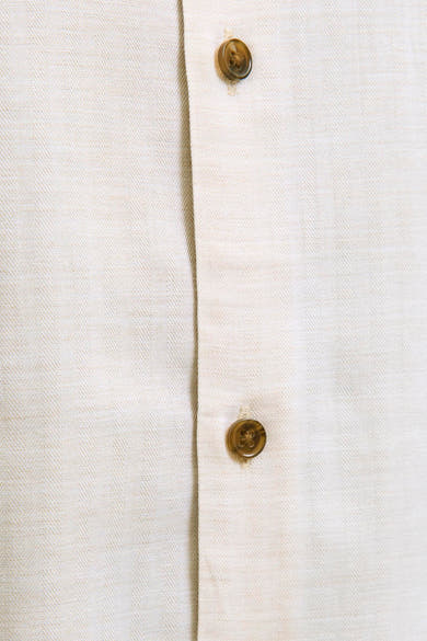 Chemise beige à manches longues de PREMIUM by JACK & JONES, avec motif chevron et boutons marron.