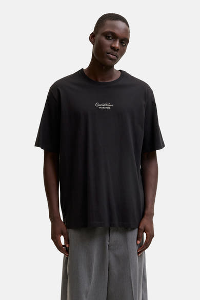 T-shirt noir d'ORIGINALS BY JACK & JONES avec inscription blanche "Our Archive OF CREATIONS" sur la poitrine.