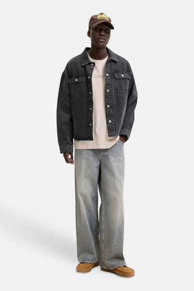 T-shirt beige de ORIGINALS BY JACK & JONES avec l'inscription "Our Archive OF CREATIONS" sur la poitrine.
