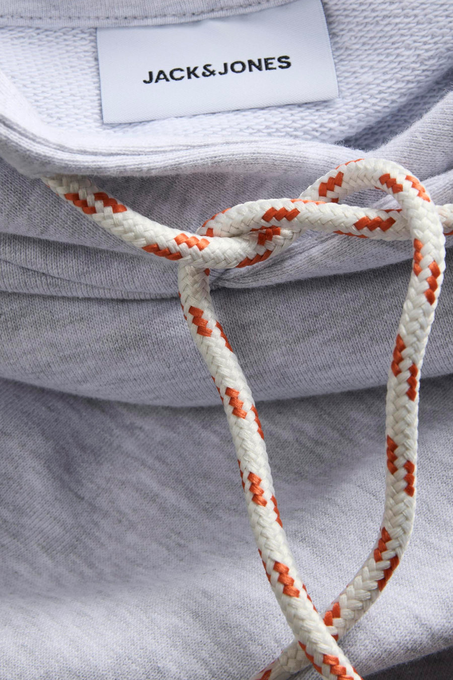 Sweat à capuche blanc de JACK&JONES, avec cordon de serrage tressé blanc et orange.