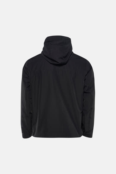 Korte zwarte jas van JACK & JONES, van achteren gezien met capuchon.