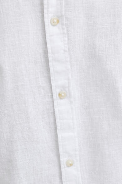 Chemise à manches longues blanche de JACK & JONES, en lin texturé avec boutons ton sur ton.