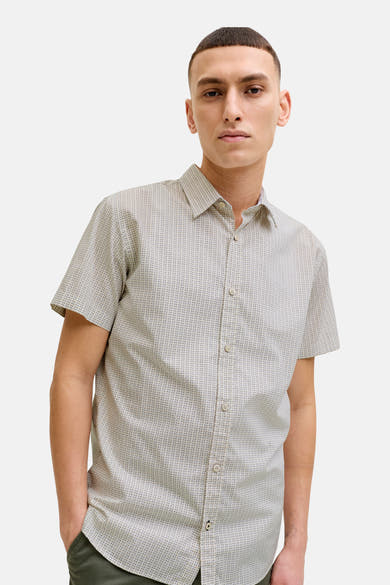 Chemise beige à manches courtes de PREMIUM by JACK & JONES, avec un motif géométrique discret.
