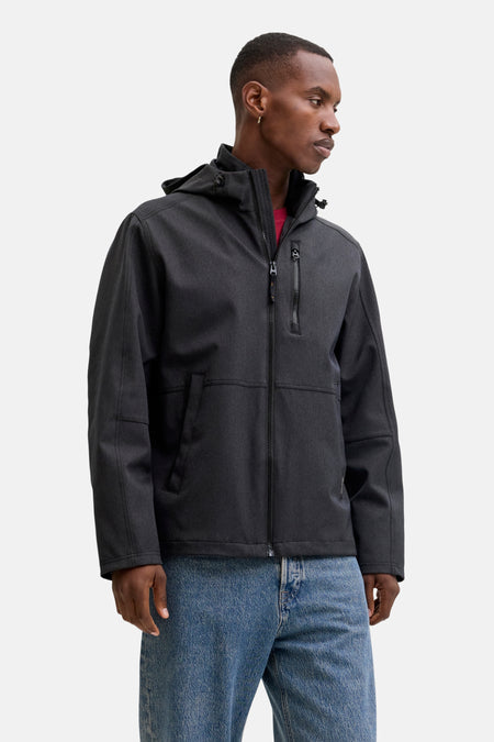Korte grijze jas met capuchon van ORIGINALS BY JACK & JONES, gedragen met een blauwe jeans.