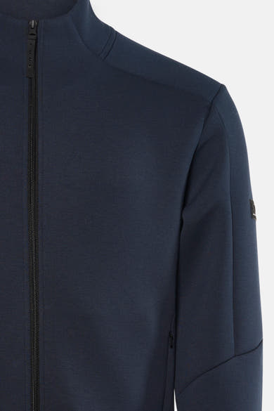Korte blauwe jas van JACK & JONES, met ritssluiting aan de voorkant en stikseldetails.