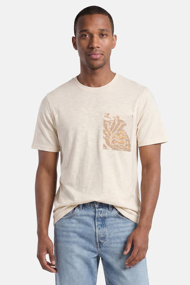 Crèmekleurig T-shirt met korte mouwen en textuur van PREMIUM by JACK & JONES met borstzak met bruin en oranje bloemenpatroon.