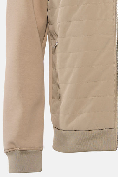 Veste beige de PREMIUM by JACK & JONES, avec fermeture éclair et détails matelassés.