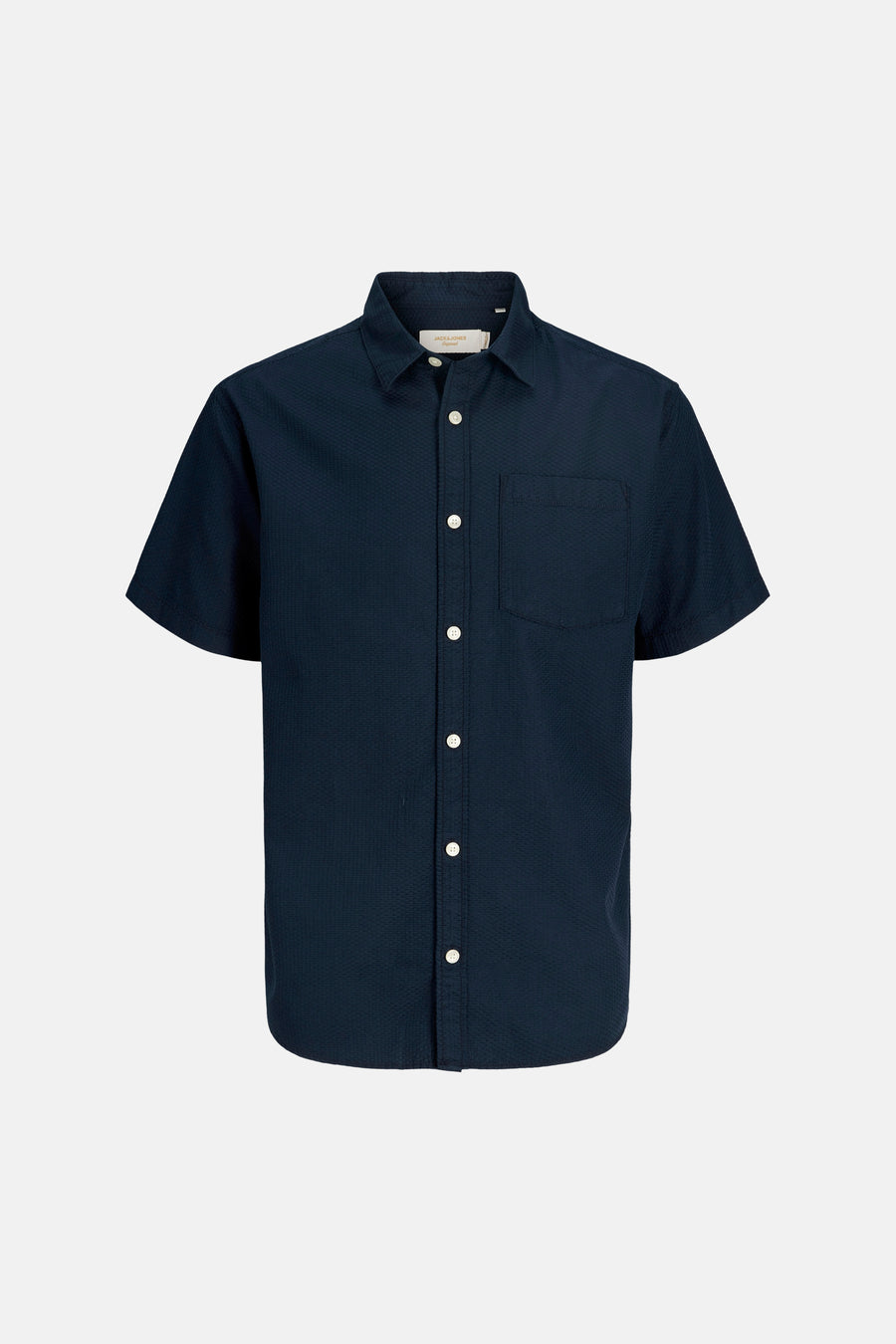 Marineblauw overhemd met korte mouwen van JACK & JONES, met opgestikte borstzak en subtiele wafelstructuur.