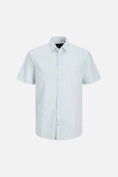 Chemise bleue à manches courtes de PREMIUM by JACK & JONES avec motif à pois discrets.