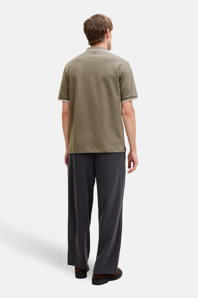 Polo à manches courtes vert par PREMIUM by JACK & JONES, avec col et bords de manches blancs.